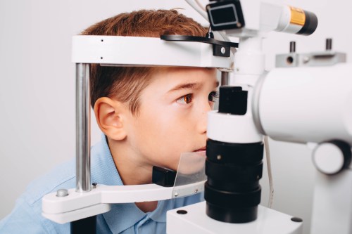 Caucasian,Boy,Receiving,Eye,Exam,At,Clinic,,Eyesight,Examination,Children Caucasian,Boy,Receiving,Eye,Exam,At,Clinic,,Eyesight,Examination,Children